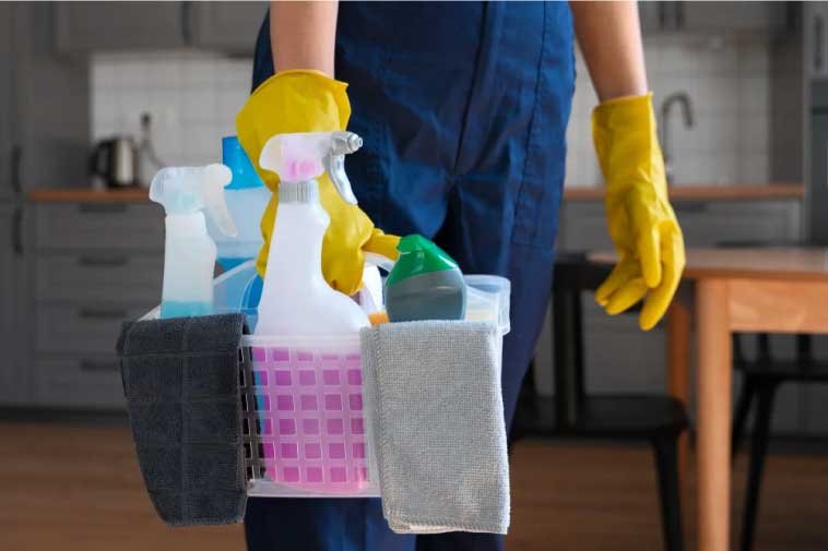 Woman carrying utensils in a basket. One-time cleaning services
