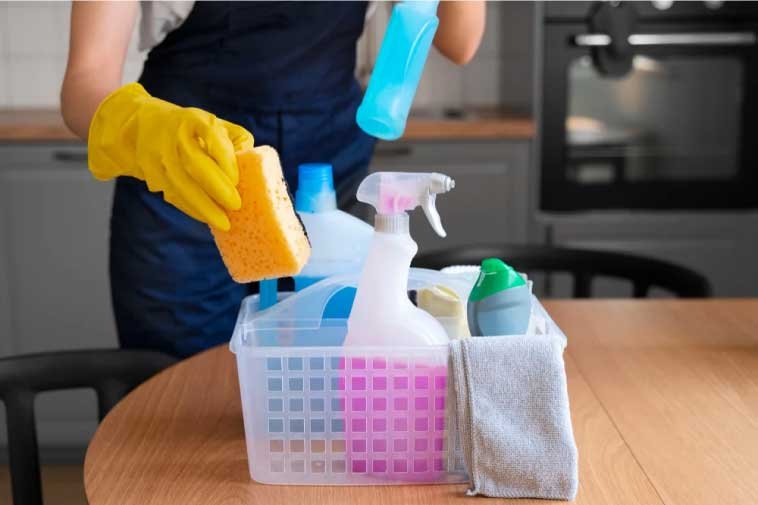 Woman placing utensils in a basket. Recurring cleaning services